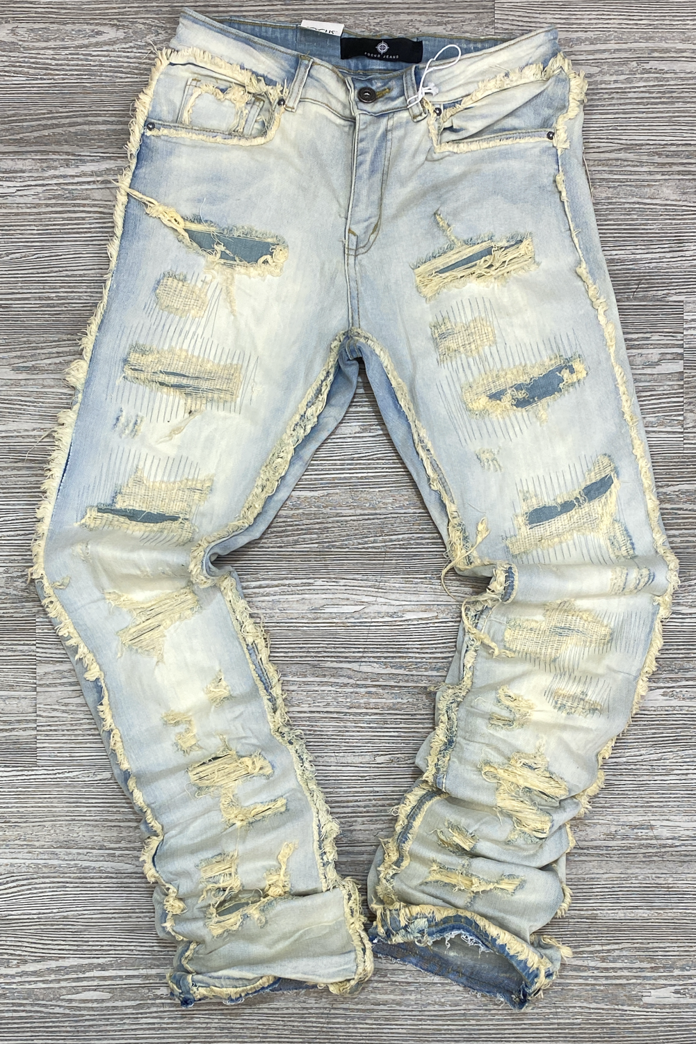 Focus- heavy distressed stacked jeans (vintage)